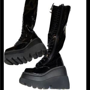 Bundle of two pairs of platform boots. Worn once.